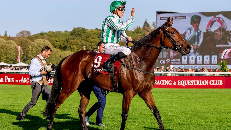 Christophe Soumillon celebrates on Miss Scott