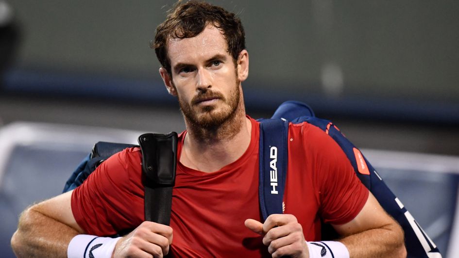 Andy Murray: The British ace leaves the court after losing to Fabio Fognini at the Shanghai Masters