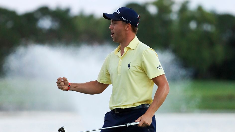 Justin Thomas celebrates