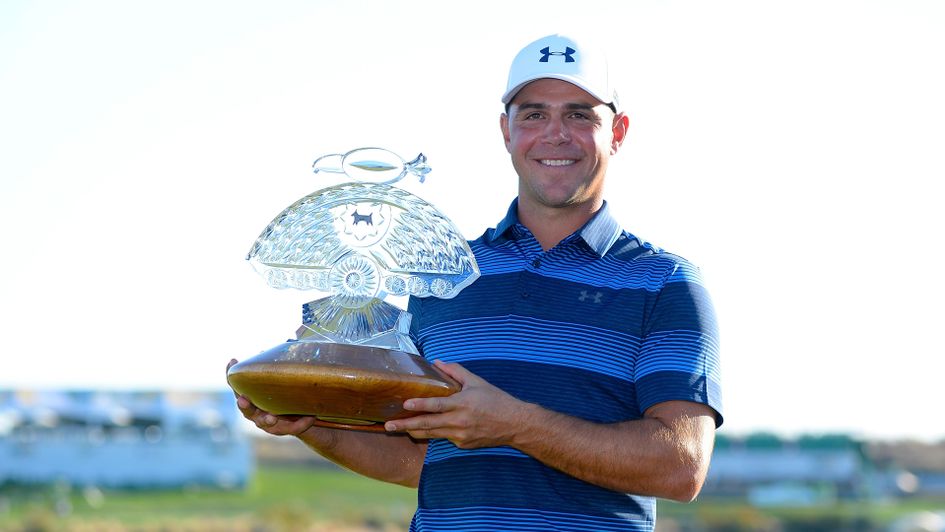 Gary Woodland with the Waste Management Phoenix Open trophy
