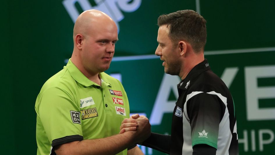 Michael van Gerwen (l) saw off Paul Nicholson (Pic: Lawrence Lustig/PDC)
