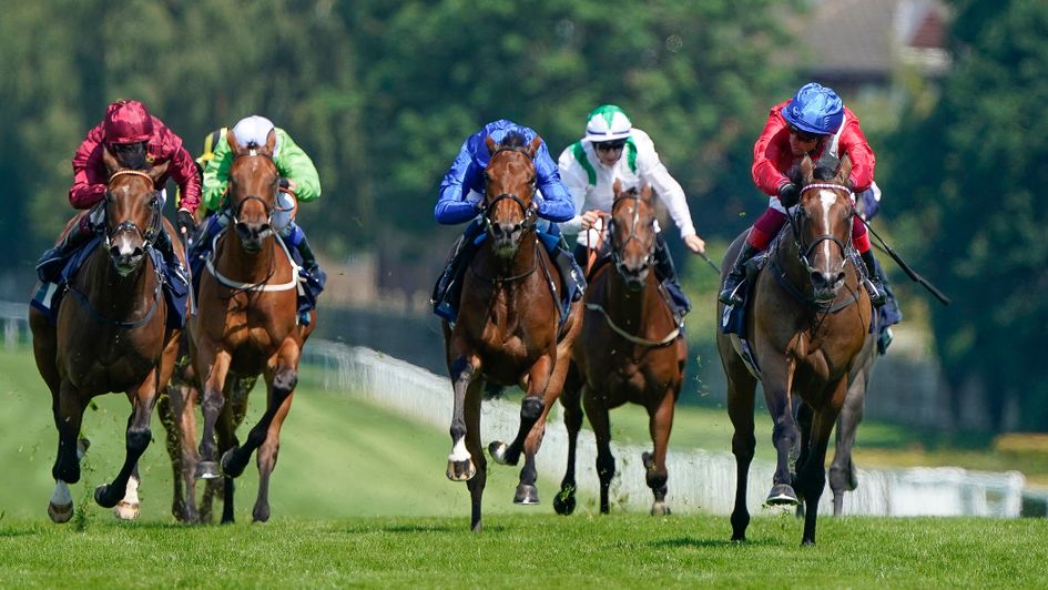 Inspiral (red, white and blue) wins under Frankie Dettori