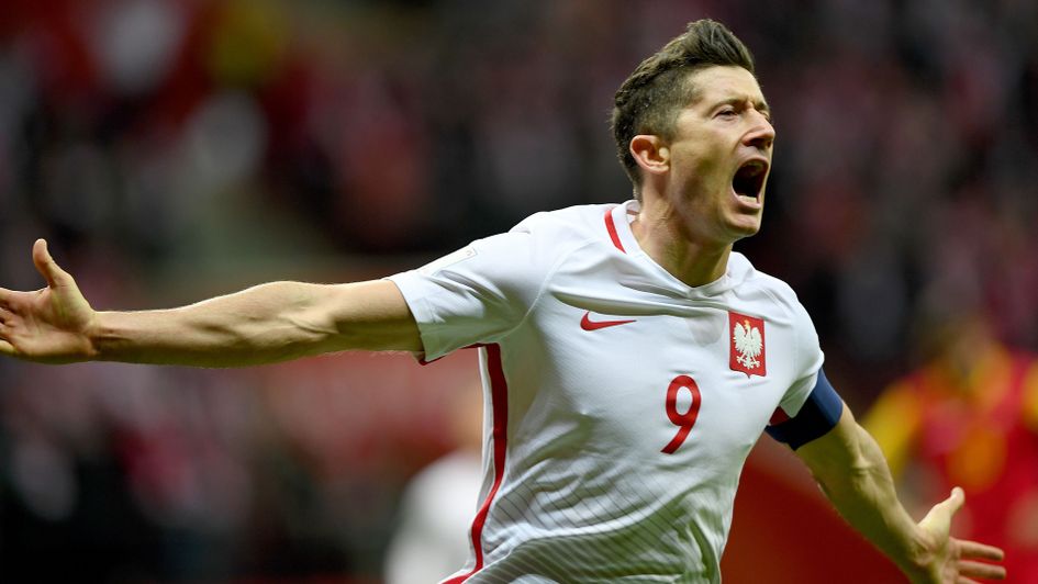 Poland striker Robert Lewandowski celebrates