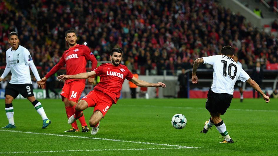 Philippe Coutinho finishes a fine Liverpool move