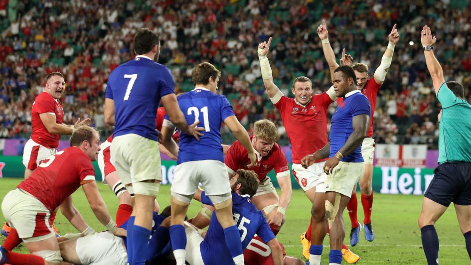 Wales celebrate their late try against France in the Rugby World Cup quarter-final