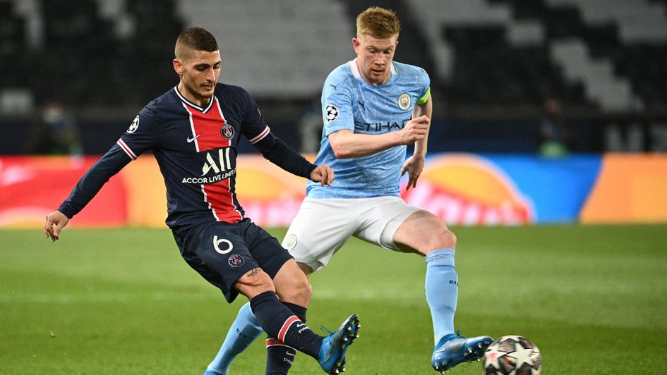 Marco Verratti looks to keep the ball away from Kevin De Bruyne