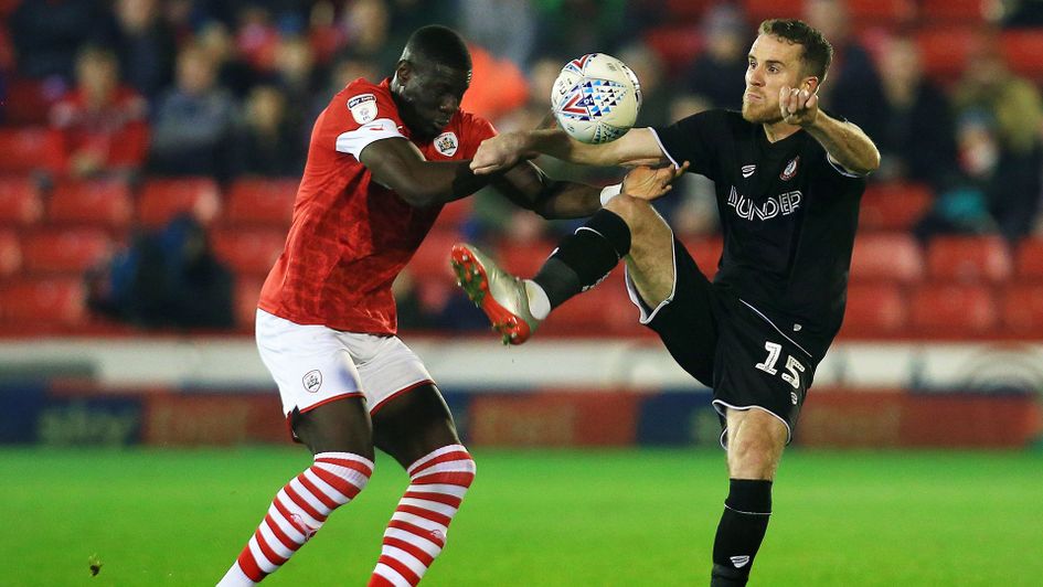 Bambo Diaby and Marley Watkins battle for the ball