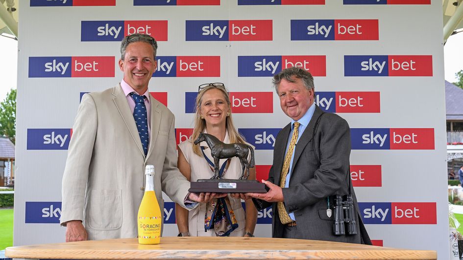Tim Easterby (right) receives his prize - credit Hannah Ali