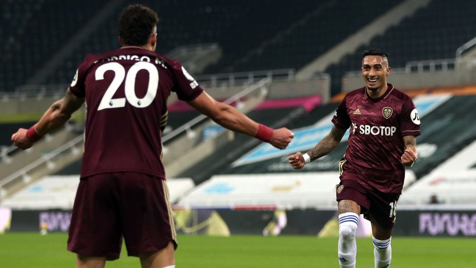 Rodrigo (left) and Raphinha celebrate for Leeds