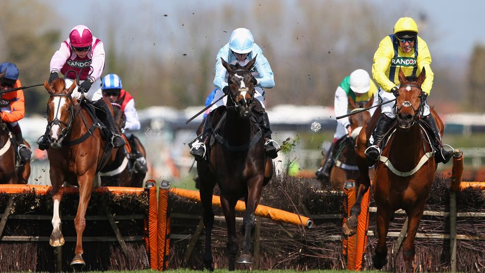 Black Op (centre) battles to Aintree glory