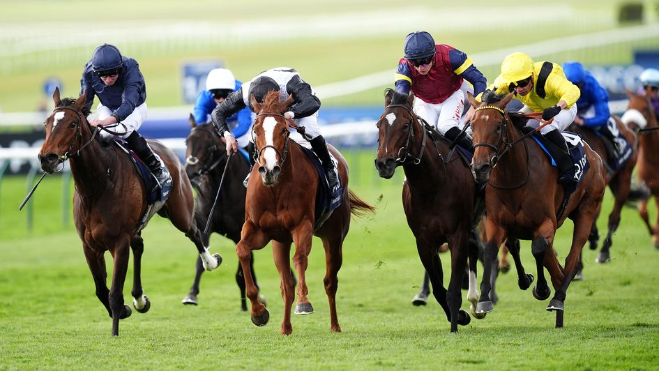 Elmalka (right) came from near the back to win the Guineas