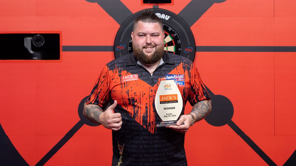Michael Smith celebrates victory
