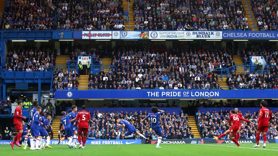 Trent Alexander-Arnold scores his free-kick against Chelsea