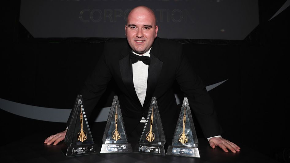 World champion Rob Cross with his four awards