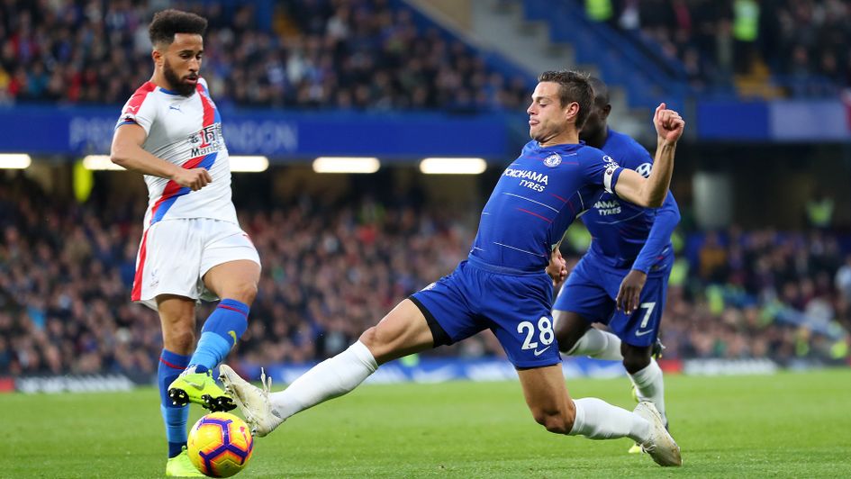 Cesar Azpilicueta (right) has been a presence in the Chelsea defence