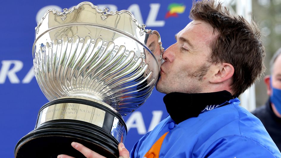 Tom Scudamore kisses the Coral Scottish Grand National trophy