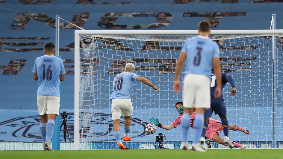 Sergio Aguero scores his penalty against Porto