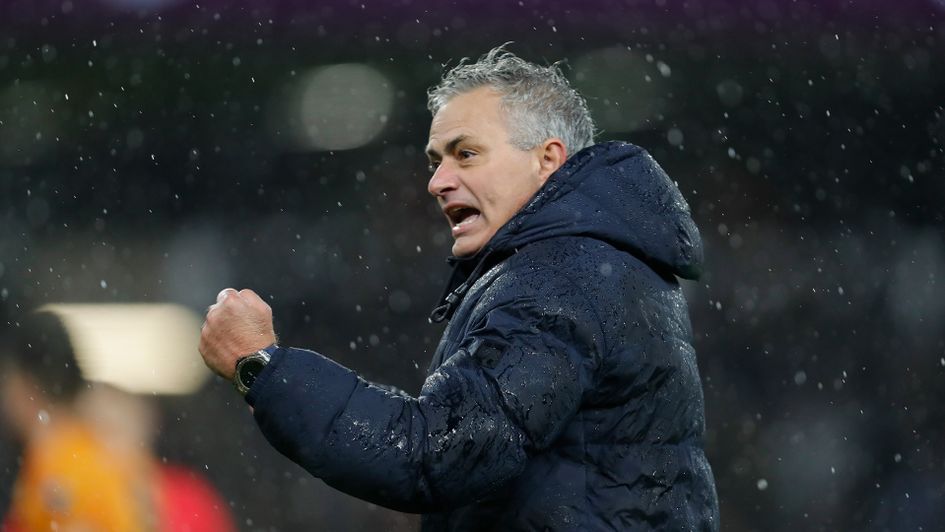 Jose Mourinho celebrates after Tottenham's win over Wolves