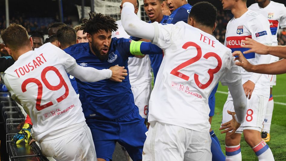 Everton and Lyon players clash at Goodison
