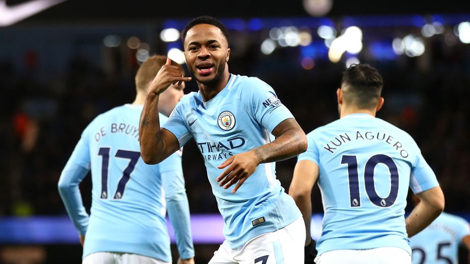 Raheem Sterling celebrates after scoring one minute into the match