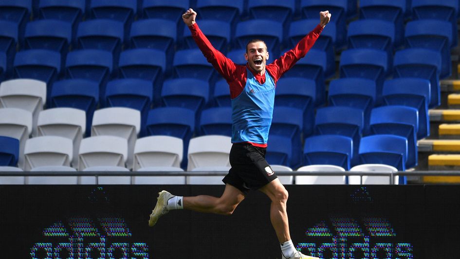 Gareth Bale: Forward celebrates during a Wales training session