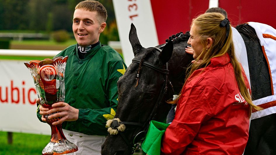Keith Donoghue holds his trophy after winning in 135th Grand Pardubice Steeplechase