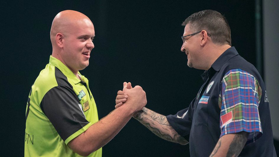 Michael van Gerwen and Gary Anderson shake hands (Picture: Lawrence Lustig/PDC)