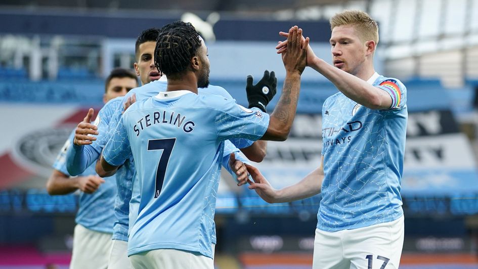 Raheem Sterling celebrates his goal with Kevin De Bruyne