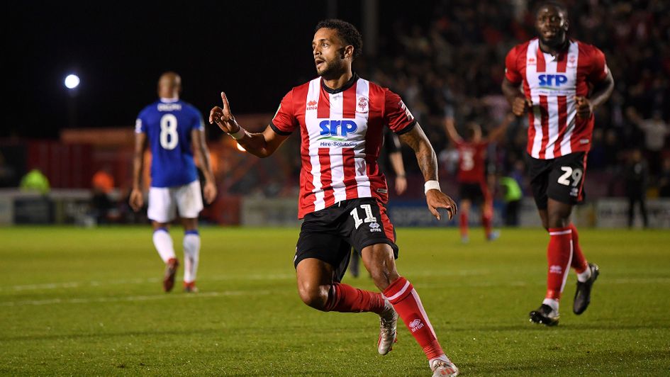 Bruno Andrade celebrates his goal for Lincoln against Everton