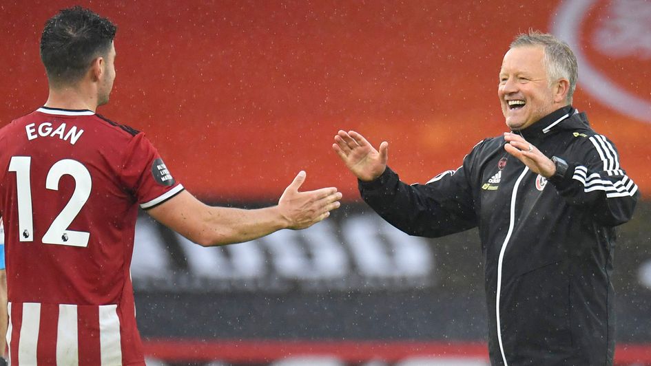 Chris Wilder: Sheffield United boss celebrates with John Egan