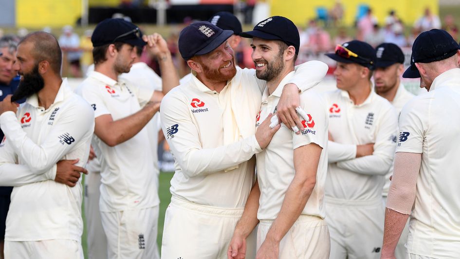 Jonathan Bairstow and Mark Wood celebrate England's victory