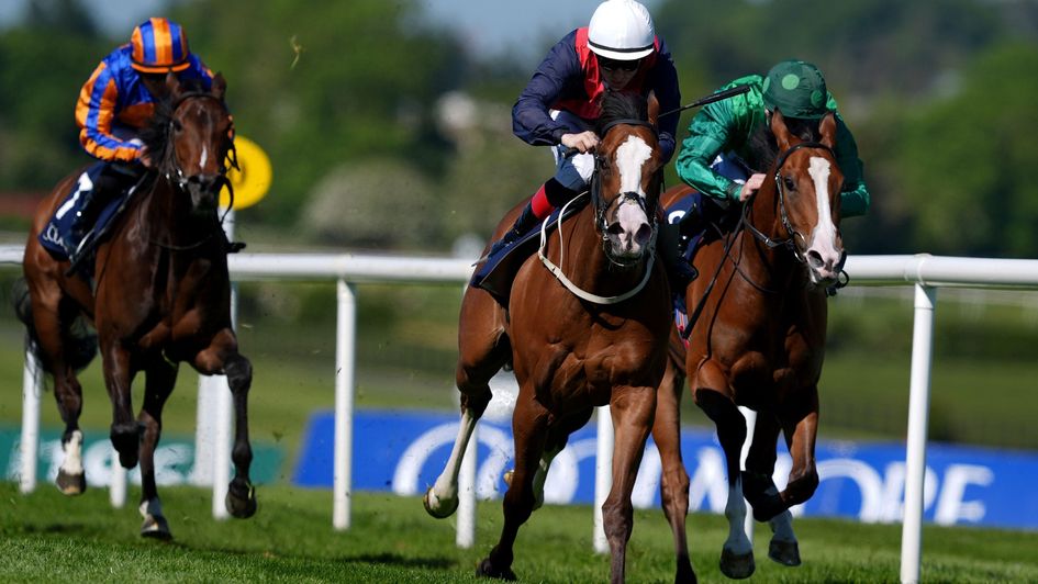 Lady Iman (white cap) quickened up well to overhaul Green Sense