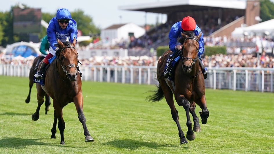 Warren Point (red caps) wins under Buick