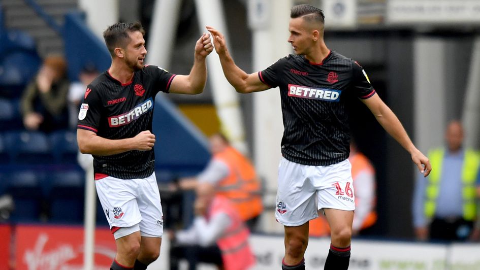 Bolton Wanderers' Pawel Olkowski (right) celebrates