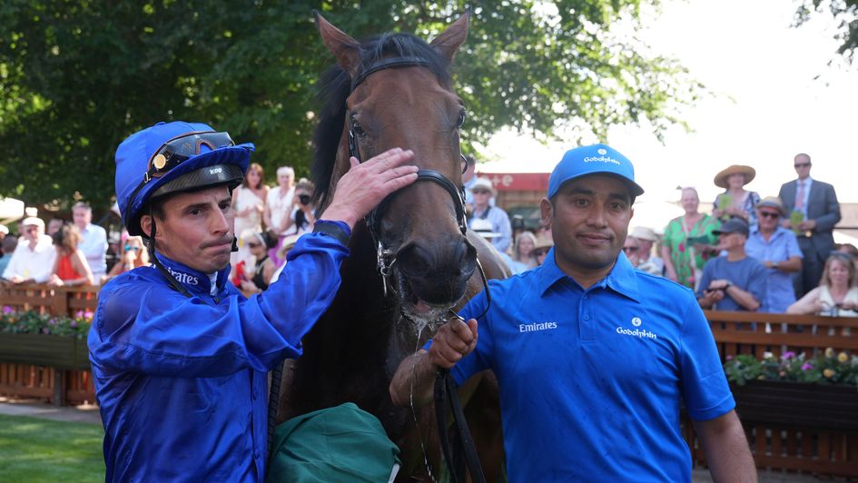 William Buick celebrates with Acting Lady after completing a Newmarket treble