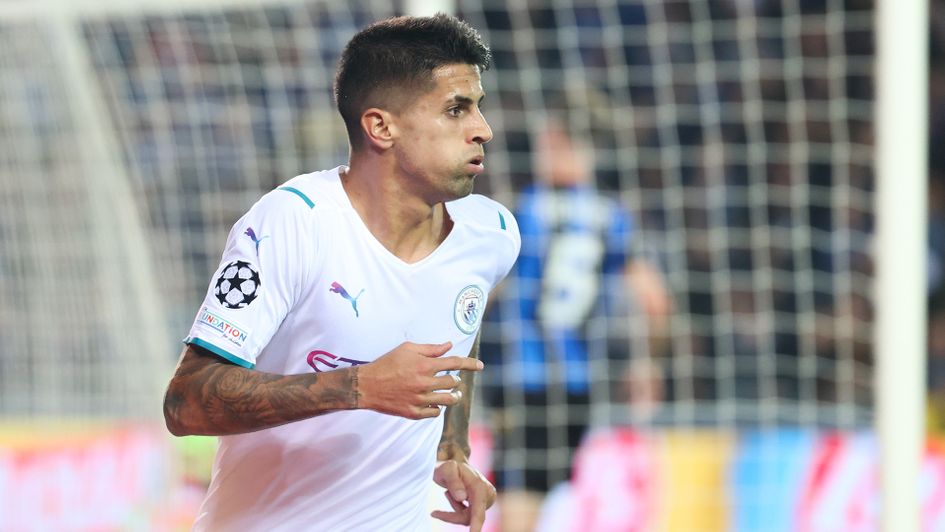 Joao Cancelo celebrates his goal against Club Brugge
