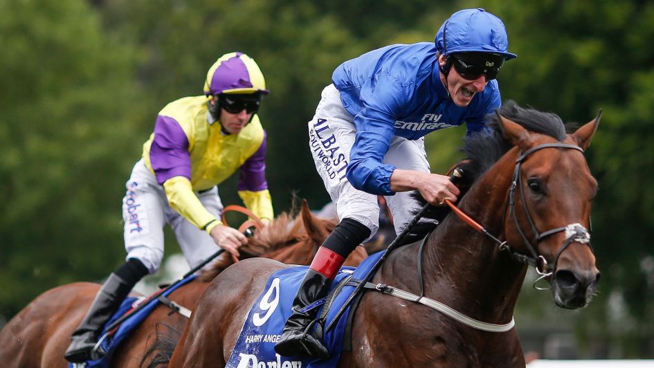 Adam Kirby celebrates after winning the July Cup on Harry Angel