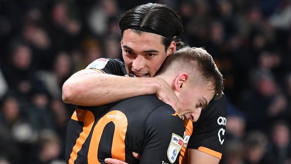 Liam Delap celebrates with Jacob Greaves