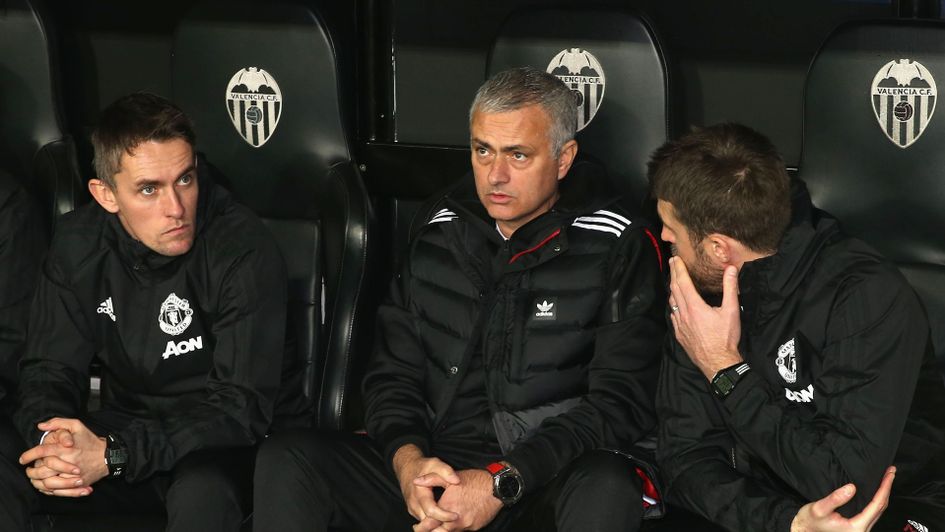 Jose Mourinho on the bench with his coaching staff