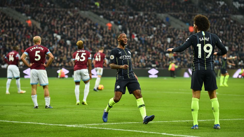 Manchester City duo Raheem Sterling and Leroy Sane celebrate at West Ham