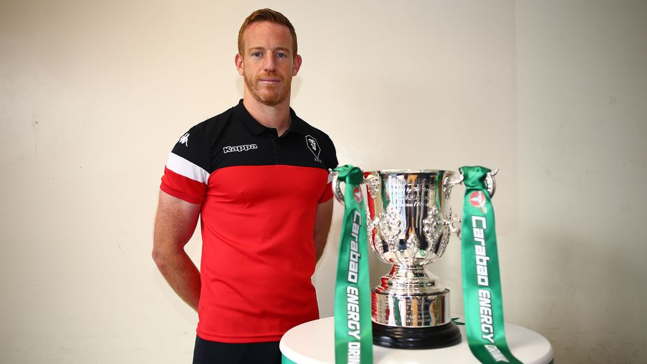 Salford striker Adam Rooney poses with the Carabao Cup