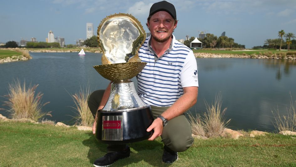 Eddie Pepperell with the Qatar Masters trophy