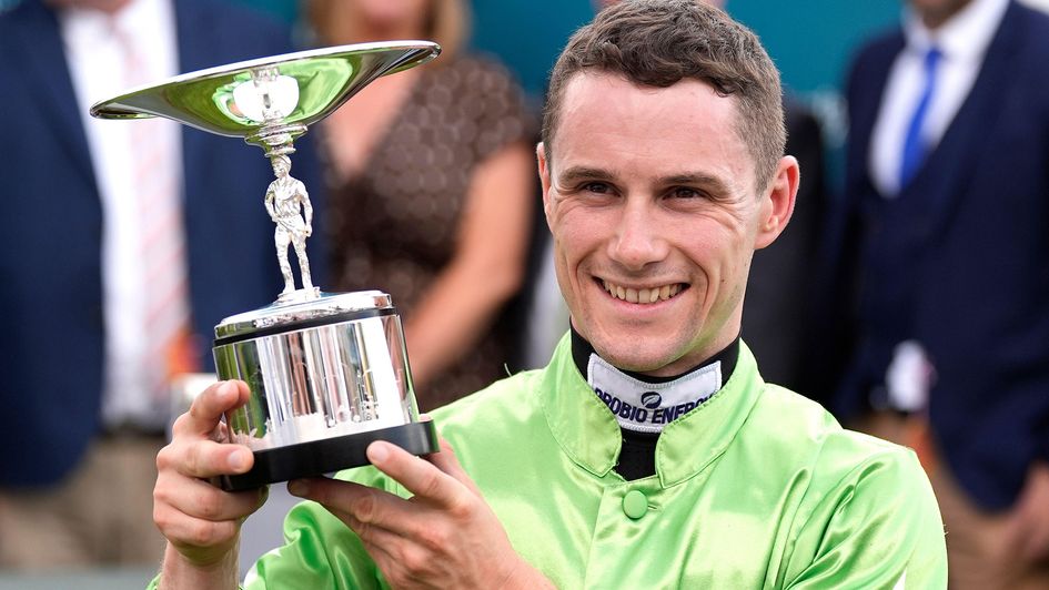 Jason Hart celebrates with the King George Qatar Stakes trophy