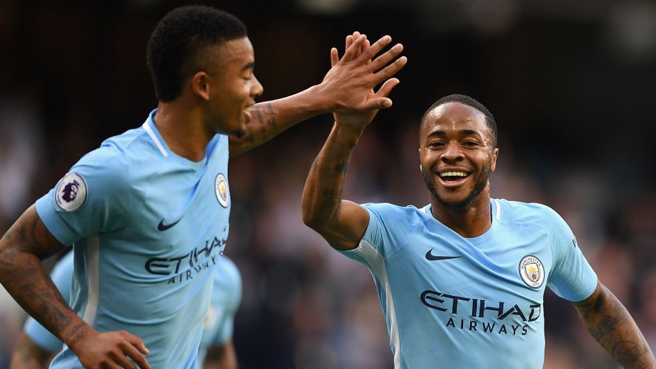 Raheem Sterling (r) celebrates with Gabriel Jesus