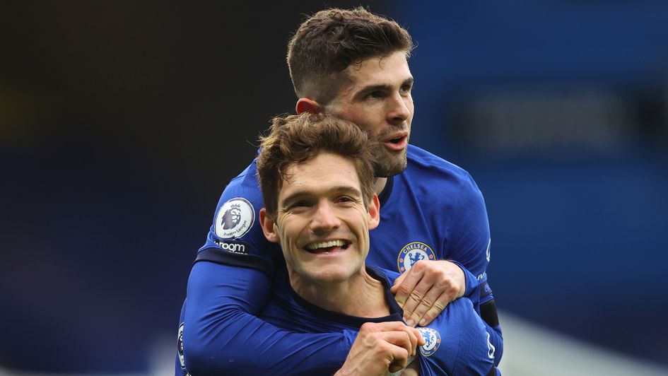 Marcos Alonso celebrates his goal against Burnley with Christian Pulisic
