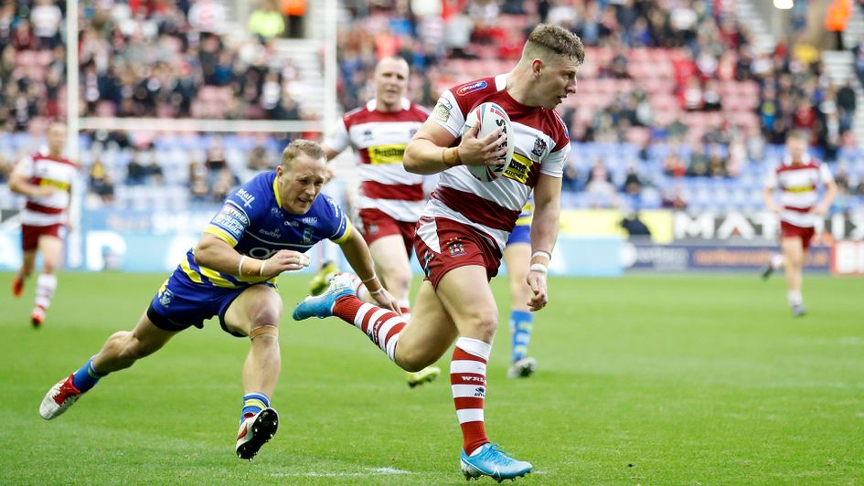Wigan Warriors' George Williams scores against Warrington