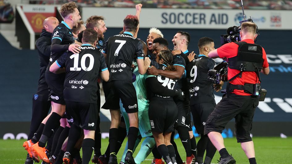 World XI celebrate their penalty shootout victory over England in the Soccer Aid match at Old Trafford
