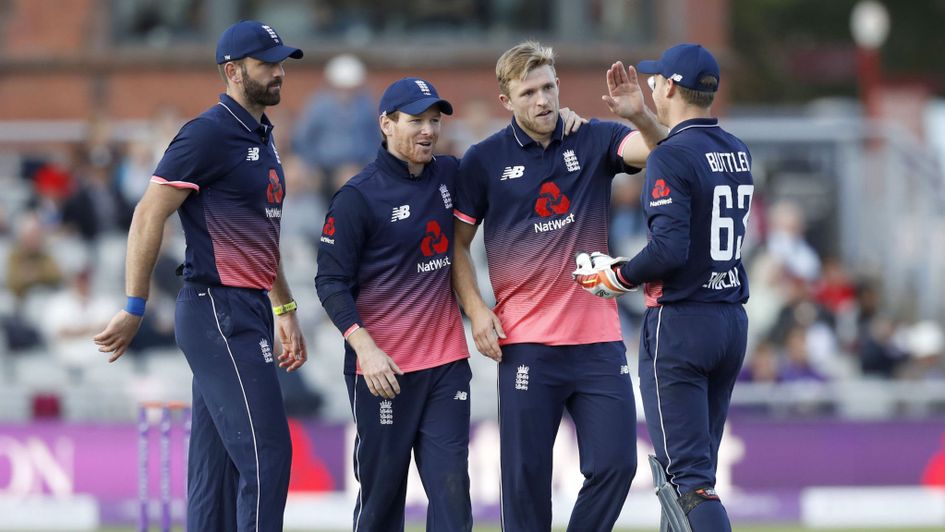 David Willey is congratulated after taking a wicket