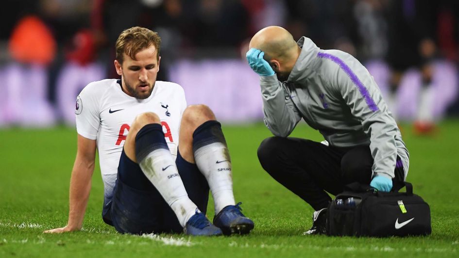 Harry Kane suffers an injury at Wembley