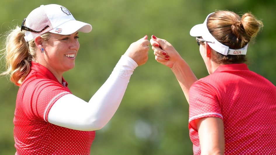 Brittany Lincicome and Brittany Lang celebrate their 3&2 success